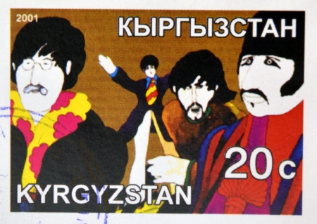 KIRZIGUISTAN - CIRCA 2001:  stamp printed in Kirziguistan shows the Beatles, circa 2001 のeditorial素材