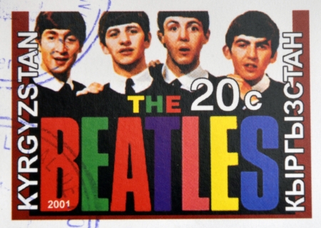 KIRZIGUISTAN - CIRCA 2001:  stamp printed in Kirziguistan shows the Beatles, circa 2001 のeditorial素材