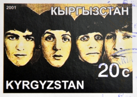 KIRZIGUISTAN - CIRCA 2001:  stamp printed in Kirziguistan shows the Beatles, circa 2001 
