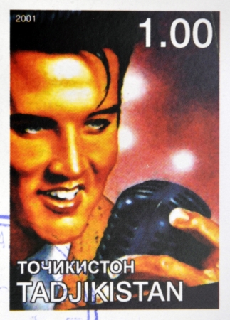 TAJIKISTAN - CIRCA 2001: stamp printed in Tajikistan shows Elvis Presley, circa 2001 のeditorial素材
