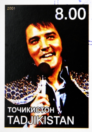 TAJIKISTAN - CIRCA 2001: stamp printed in Tajikistan shows Elvis Presley, circa 2001 のeditorial素材