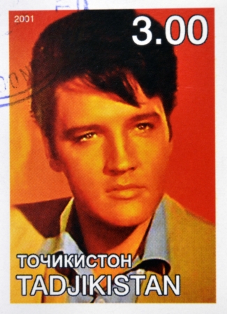 TAJIKISTAN - CIRCA 2001: stamp printed in Tajikistan shows Elvis Presley, circa 2001 のeditorial素材
