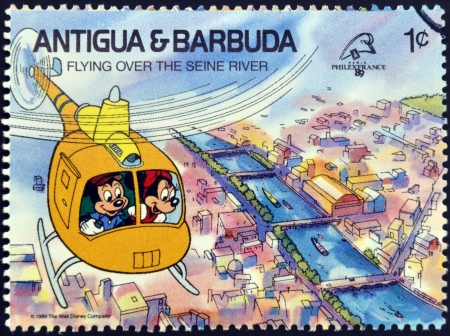 ANTIGUA AND BARBUDA - CIRCA 1989: Stamp printed in Antigua dedicated to international philatelic exhibition in France, shows flying over the seine river, circa 1989 のeditorial素材