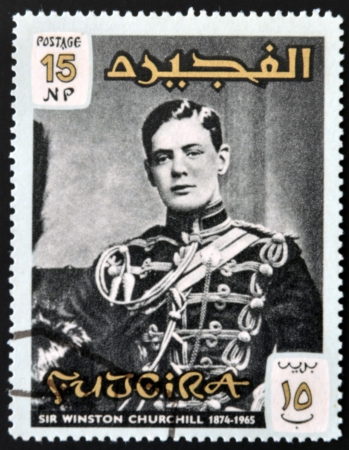 FUJERIA - CIRCA 1966: A stamp printed in Fujeira shows image of sir winston churchil, 1874-1965, circa 1966 のeditorial素材