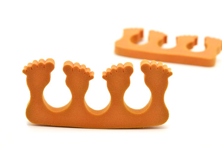 Toe separator. Cosmetic procedures - pedicureの写真素材