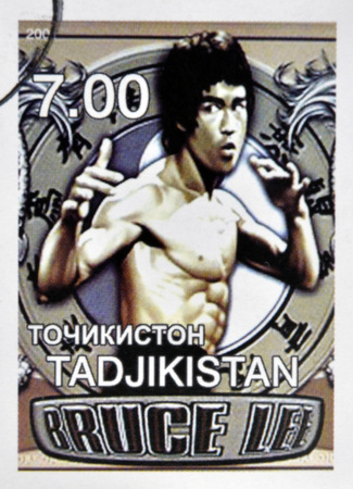 TADJIKISTAN - CIRCA 2001: A stamp printed in Tadjikistan showing Bruce Lee, circa 2001 のeditorial素材