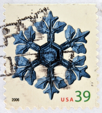UNITED STATES OF AMERICA - CIRCA 2006: A stamp printed in USA shows snow crystal, circa 2006のeditorial素材