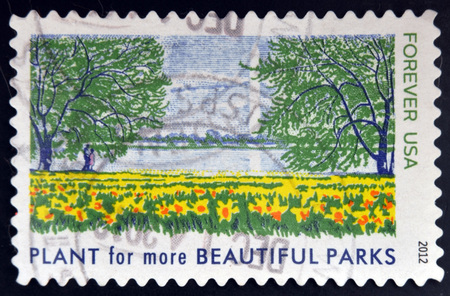 UNITED STATES OF AMERICA - CIRCA 2012: A stamp printed in USA dedicated to Lady Bird Johnson, shows Plant for more Beautiful Parks, circa 2012の写真素材