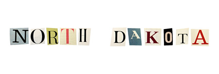 North Dakota word formed with magazine letters on a white backgroundの写真素材