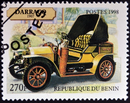 BENIN - CIRCA 1998: A stamp printed in Benin shows vintage car, circa 1998 のeditorial素材
