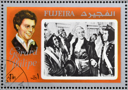 FUJEIRA - CIRCA 1972 : stamp printed in Fujeira shows actor Gerard Philipe, circa 1972 のeditorial素材