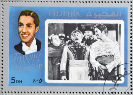 FUJEIRA - CIRCA 1972 : stamp printed in Fujeira shows actor Tyrone Power, circa 1972のeditorial素材