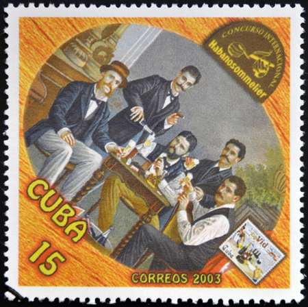 CUBA - CIRCA 2003: A stamp printed in Cuba dedicated to the wine shows a gathering of friends drinking, circa 2003のeditorial素材