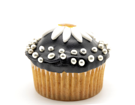 chocolate cupcake with a daisyの写真素材