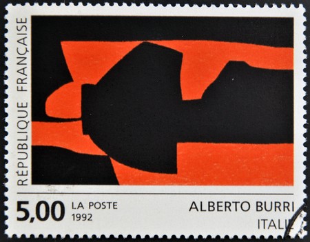 FRANCE - CIRCA 1992: A stamp printed in France shows a work by Alberto Burri, circa 1992のeditorial素材