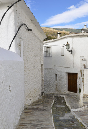 A street in Pampaneira a white village in the Alpujarras, Andalusiaの写真素材