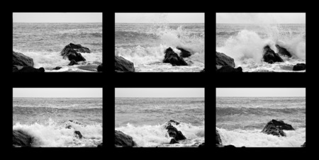 the waves hitting the rocksの写真素材