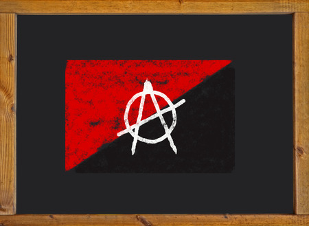 anarchist flag on a blackboardの写真素材