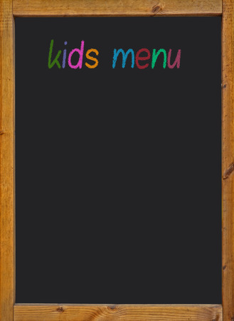 Kids Menu written on a black blackboardの写真素材