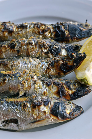 plate of grilled sardinesの写真素材
