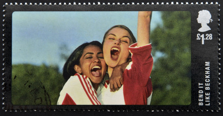 UNITED KINGDOM - CIRCA 2014: A stamp printed in Great Britain dedicated to Great British Film, shows Bend It Like Beckham , circa 2014の写真素材