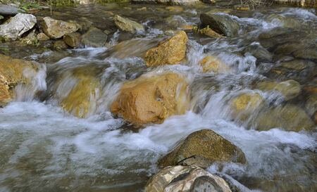 river down between rocks
