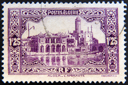 ALGERIA - CIRCA 1936: a stamp printed in Algeria shows Admiralty Building, Algiers, circa 1936のeditorial素材
