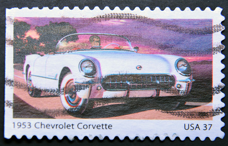 UNITED STATES OF AMERICA - CIRCA 2013: a stamp printed in USA showing an image of a 1953 Chevrolet Corvette car, circa 2013.のeditorial素材