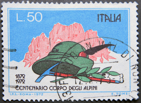ITALY - CIRCA 1972: A postage stamp of Italy, shows Mountains, Alpinist's hat, pick and laurelのeditorial素材