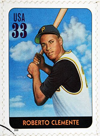 GRANADA, SPAIN - DECEMBER 1, 2015: A stamp printed in USA dedicated to Legends of Baseball shows Roberto Clemente, 2000のeditorial素材