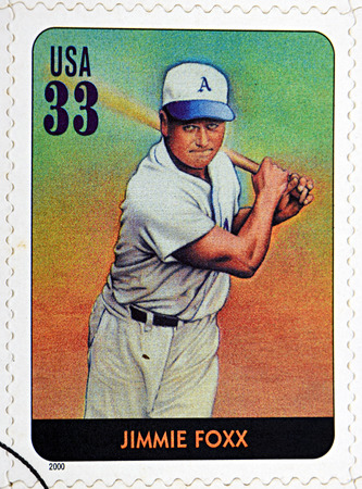 GRANADA, SPAIN - DECEMBER 1, 2015: A stamp printed in USA dedicated to Legends of Baseball shows Jimmie Foxx, 2000のeditorial素材
