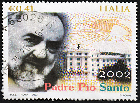 GRANADA, SPAIN - NOVEMBER 30, 2015: A stamp printed in Italy shows Pio of Pietrelcina , 2002のeditorial素材