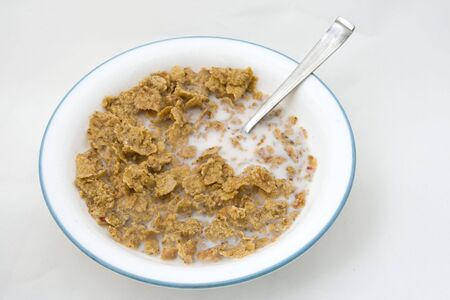 It's an adult style breakfast cereal in a bowl against a white background.