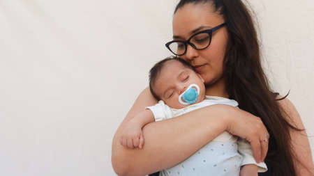 mum holding baby boy