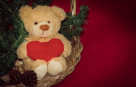 merry christmas postcard design with teddy bear and gift box redの写真素材