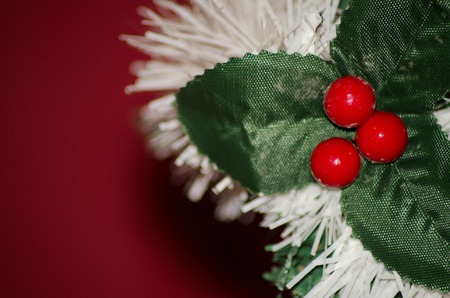close up photo of christmas ornament on the christmas tree red background copy spaceの写真素材