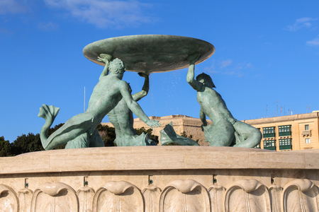 Valletta, Malta, 31. january 2018, The Triton Fountain at the City Gate entrance to Valletta on Malta in winterのeditorial素材