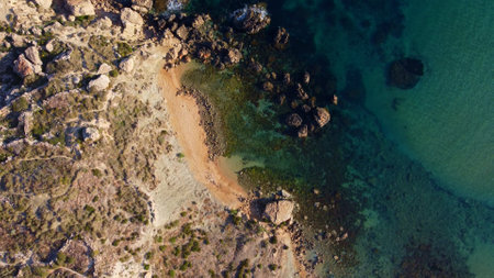 Rocky beach and sapphire sea water on the Maltese island, mediterranean sea, Ghajn Tuffieha bay , Malta. High quality photoの写真素材