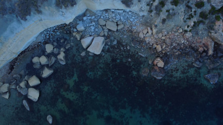 Rocky beach and sapphire sea water on the Maltese island, mediterranean sea, Ghajn Tuffieha bay , Malta. High quality photoの写真素材