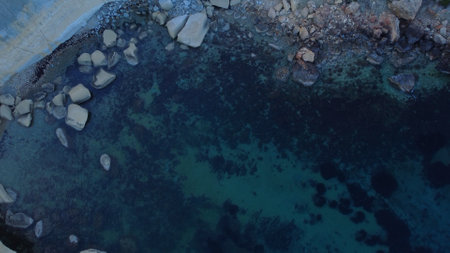Rocky beach and sapphire sea water on the Maltese island, mediterranean sea, Ghajn Tuffieha bay , Malta. High quality photoの写真素材