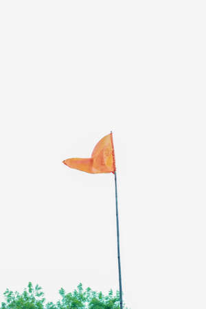 Wavy Orange Silk Flag isolated on white background