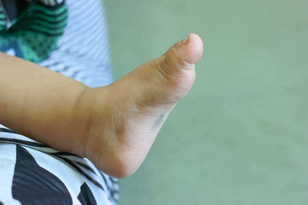 Baby feet in mother hands