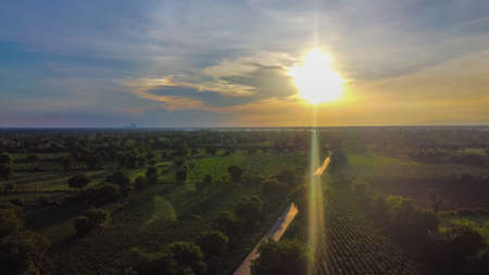 Aerial view of golden sunset in landscapeの写真素材