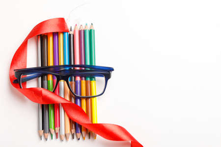 The concept of the teacher's day, School stationery, pencil, pen, note, Spectacles in pen boxの写真素材