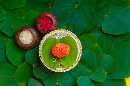 Happy Dussehra greeting card , green apta leaf and rice, Indian festival dussehra