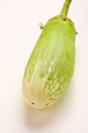 fresh eggplants isolated on white backgroundの写真素材