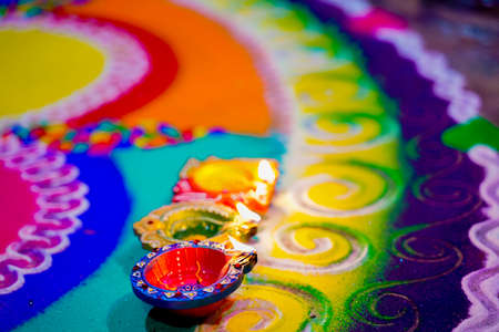 Indian Festival Diwali , lamp on colorful rangoli designの写真素材