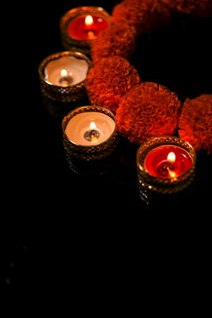 Indian Festival Diwali , oil lamp and flower design on dark backgroundの写真素材