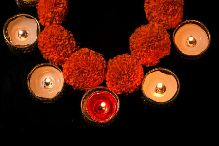 Indian Festival Diwali , oil lamp and flower design on dark backgroundの写真素材
