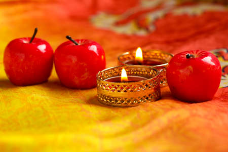 Indian festival Diwali , Glowing apple shape candleの写真素材